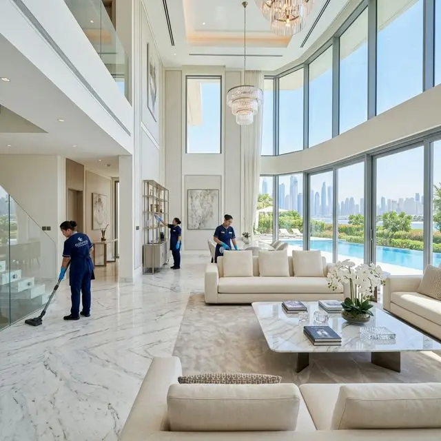 Best Shine team performing luxury villa cleaning in Dubai — marble floors and high-ceiling dusting
